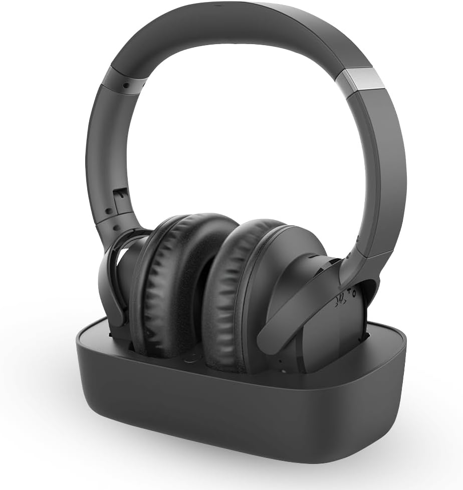 Avantree Ensemble black over-ear wireless TV headphones resting on their charging dock, which doubles as the TV transmitter