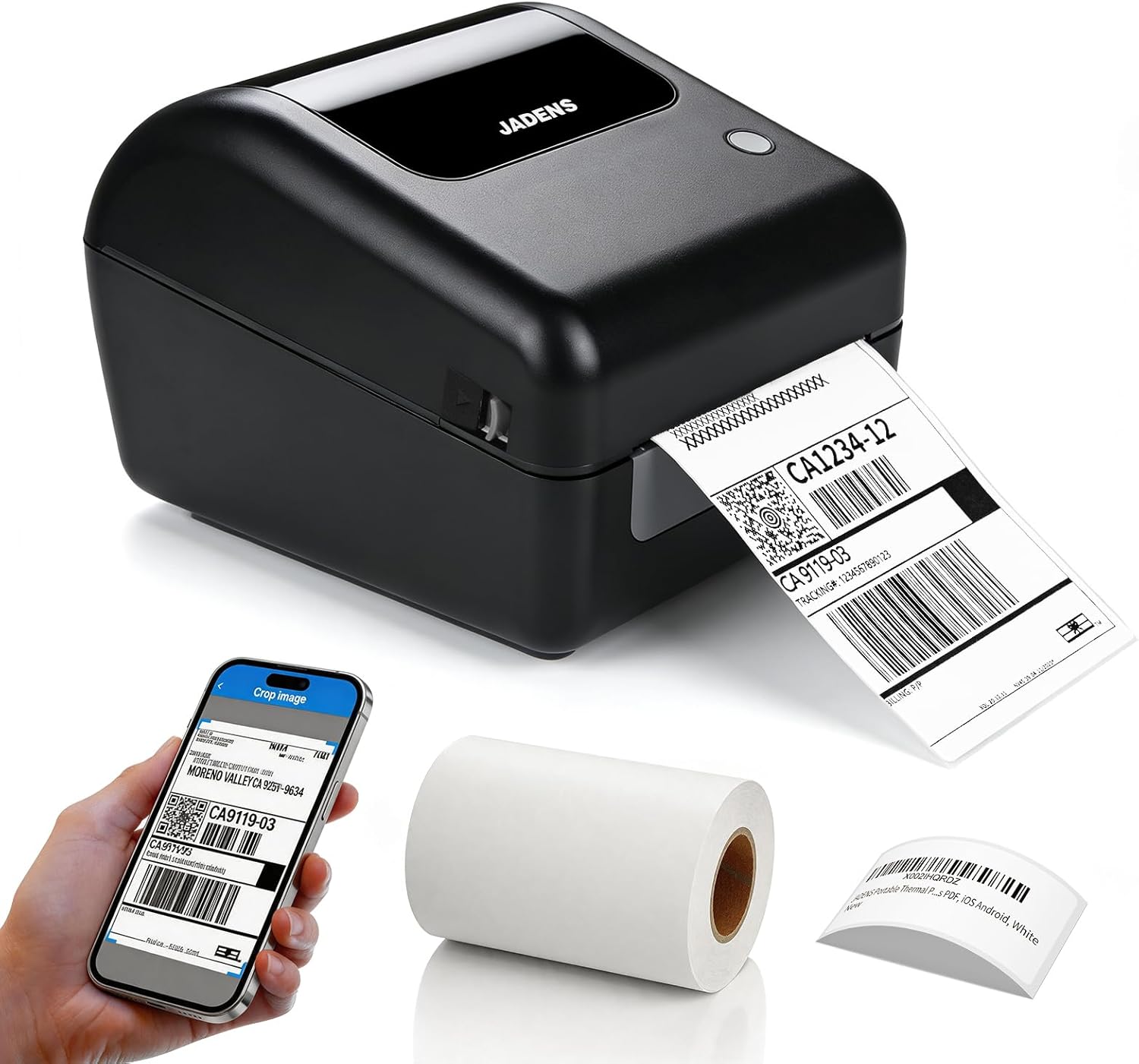 JADENS 4x6 thermal label printer feeding out a barcoded shipping label beside a phone showing the crop screen and a roll of labels