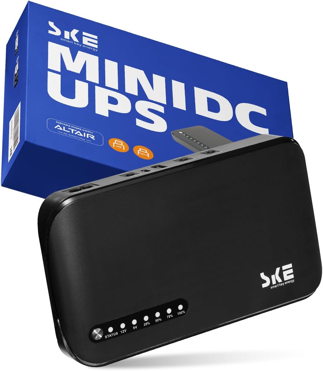 SKE Mini UPS DC20000mAh battery backup unit standing in front of its blue retail box, with the battery level LED strip visible