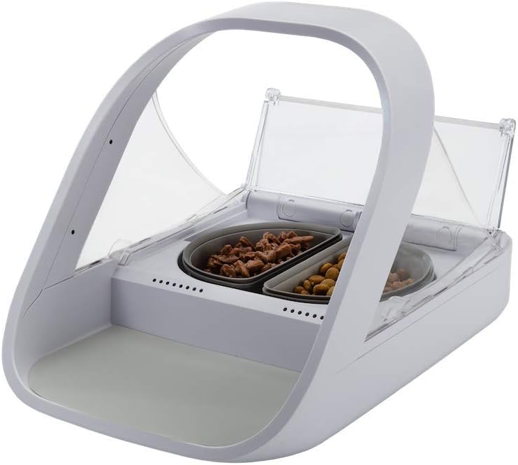 Sure Petcare SureFeed Microchip Pet Feeder Connect in white, with the lid open over a divided bowl
