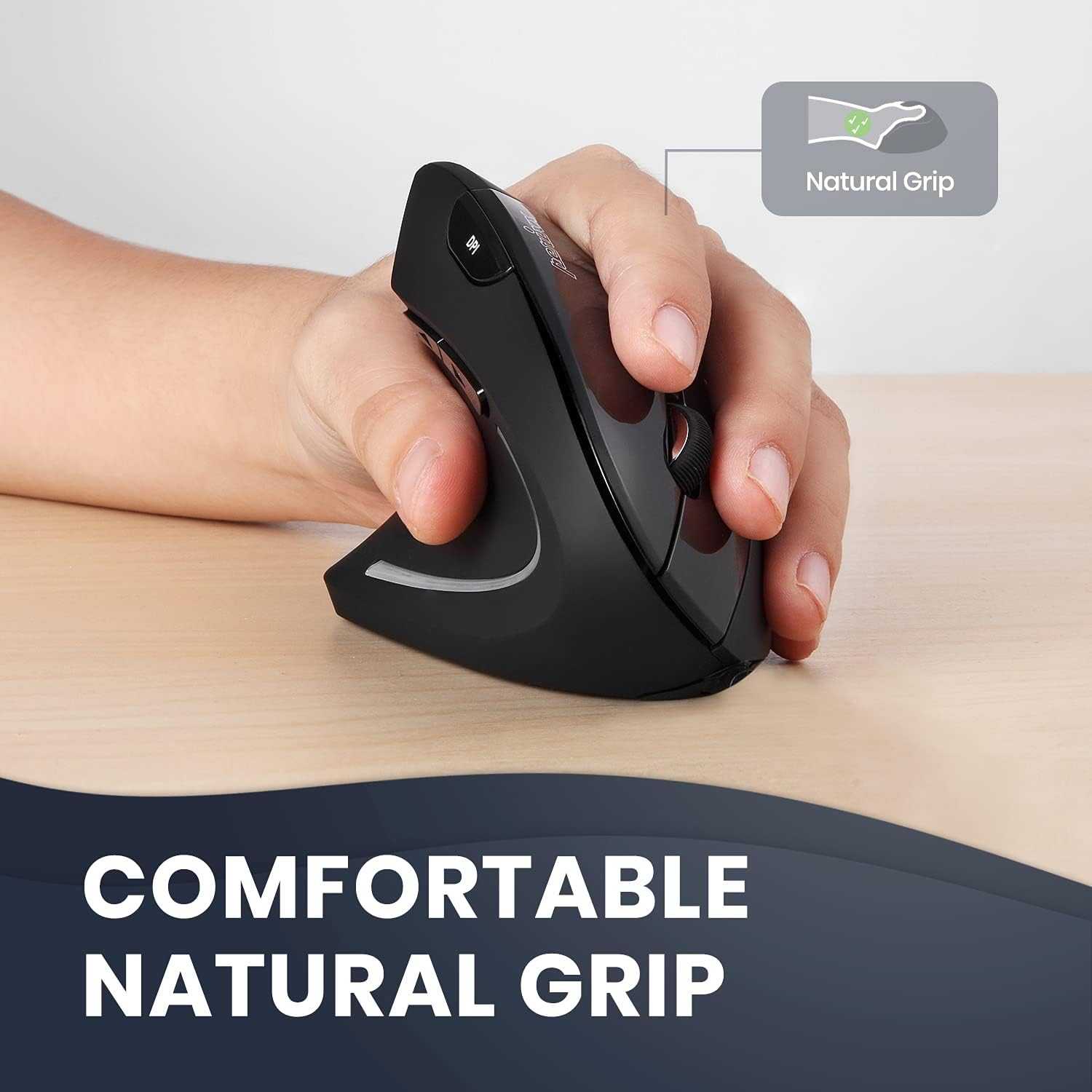 Hand gripping the Perixx vertical mouse in a natural handshake position on a desk
