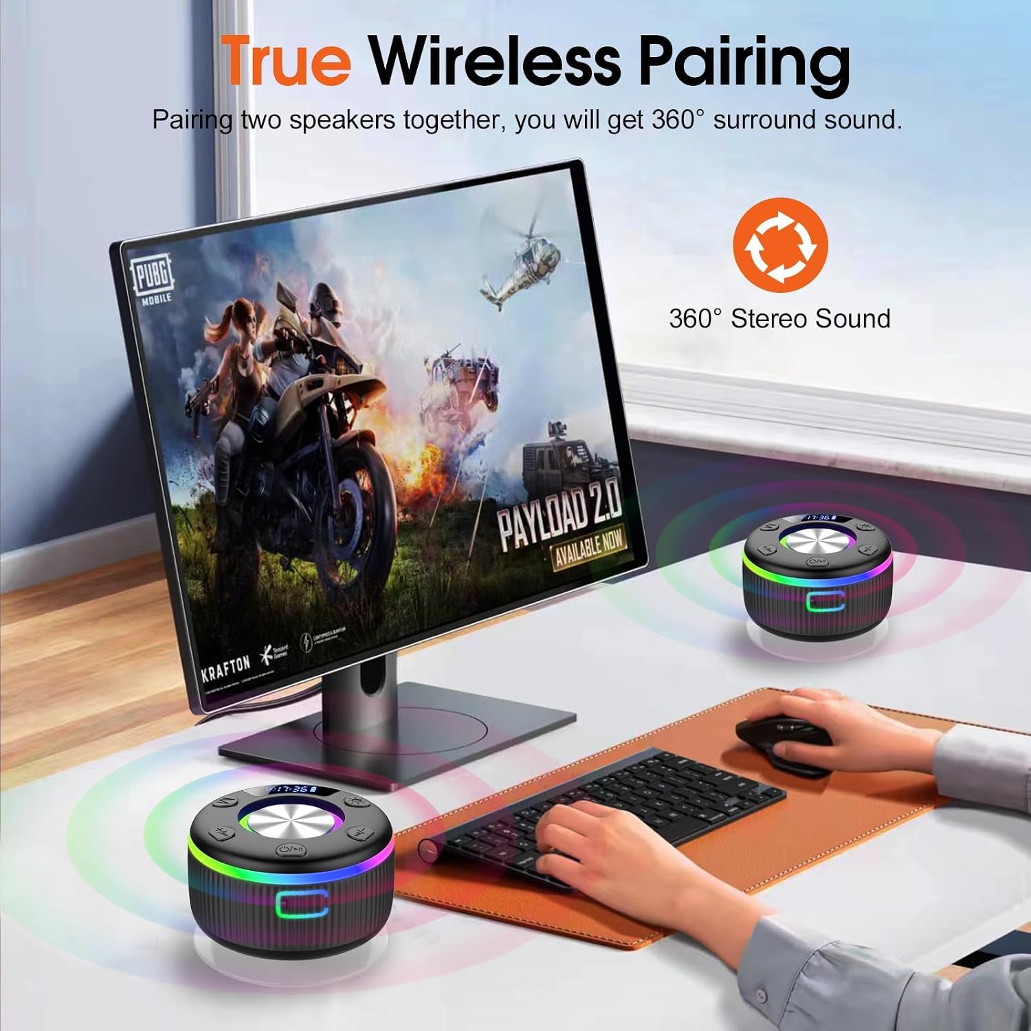 Two Q90 speakers standing on a desk either side of a monitor, from the listing's True Wireless Pairing panel