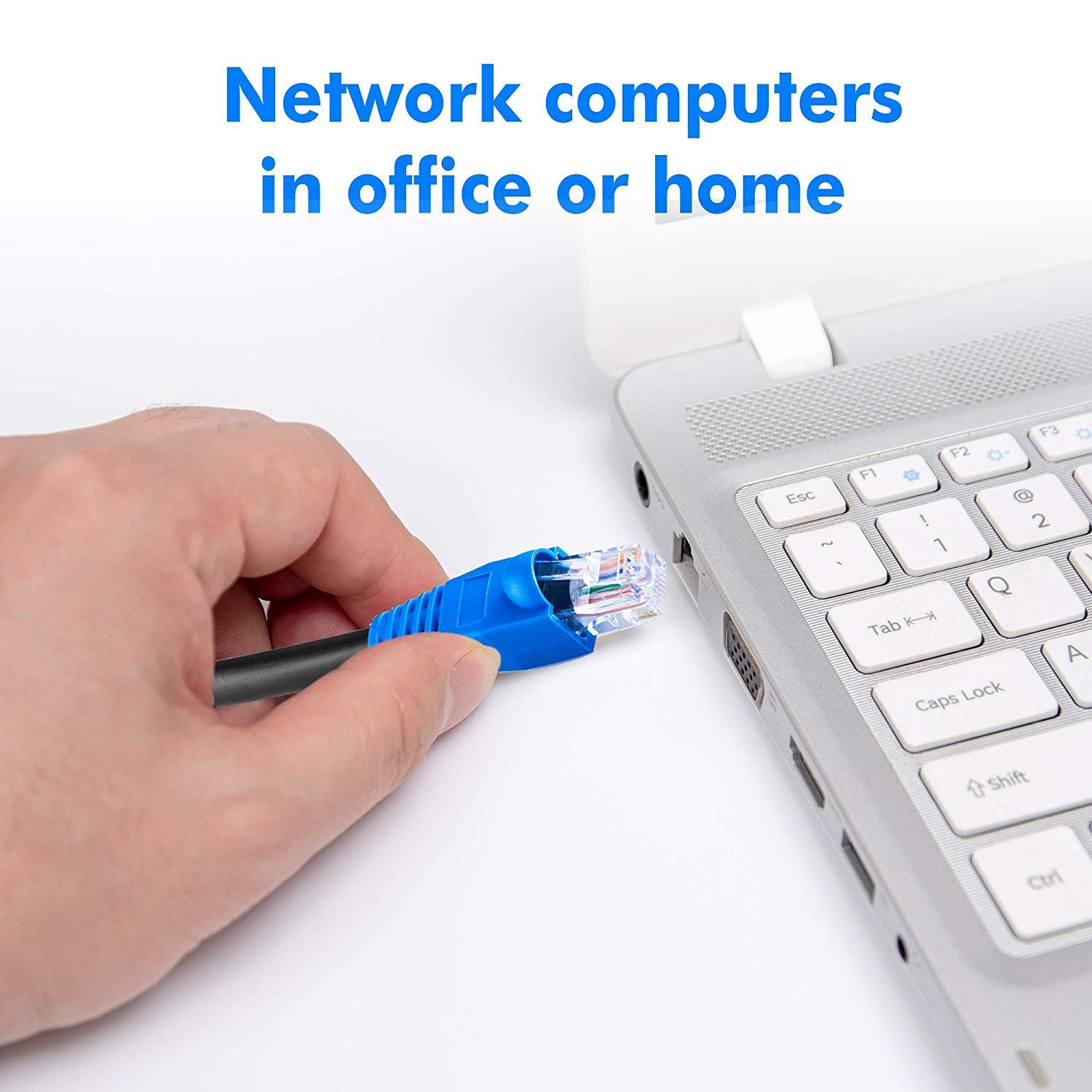 Hand plugging a blue RJ45 connector into the ethernet port on the side of a laptop