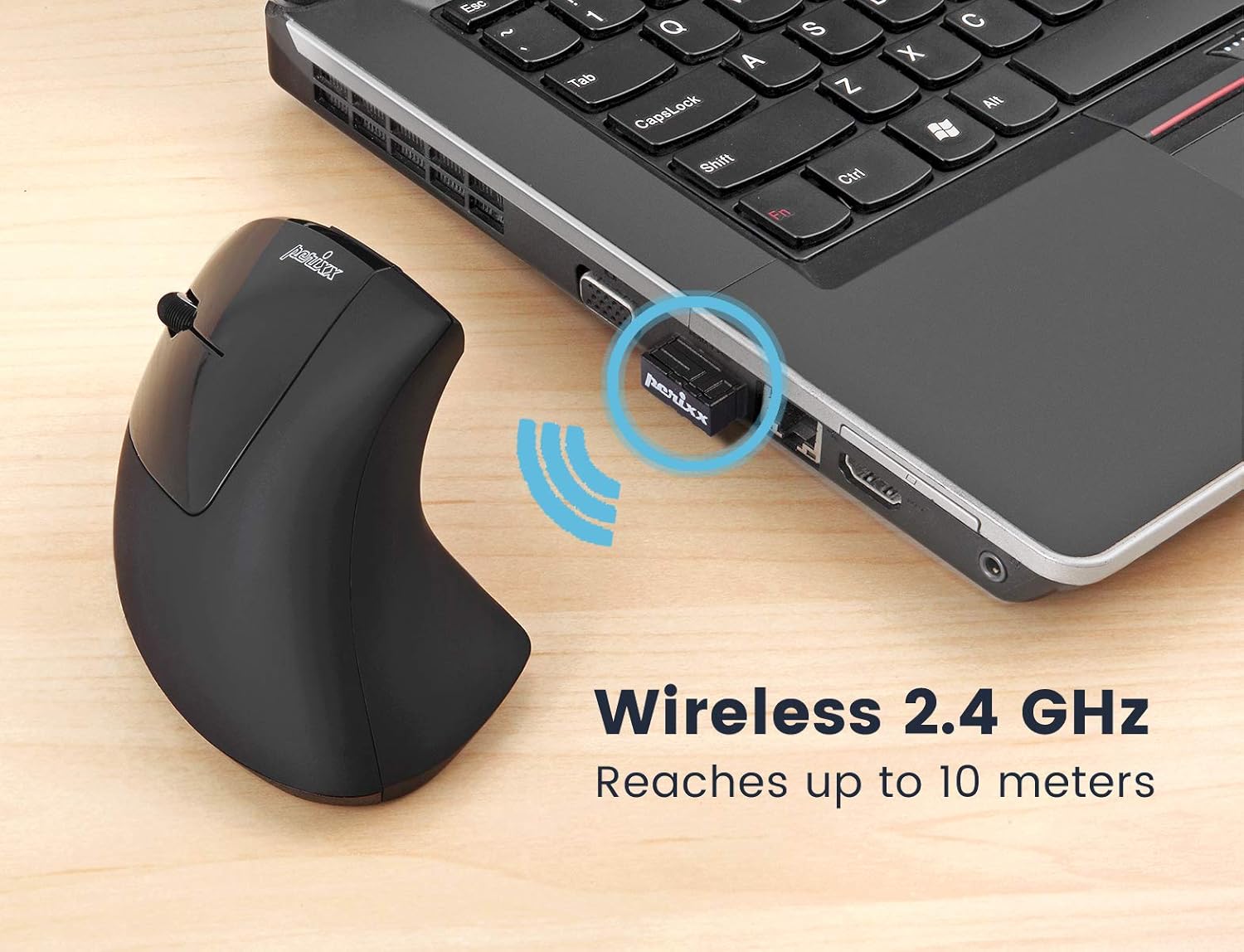 Perixx vertical mouse beside a laptop with the 2.4GHz nano USB receiver plugged into the laptop port