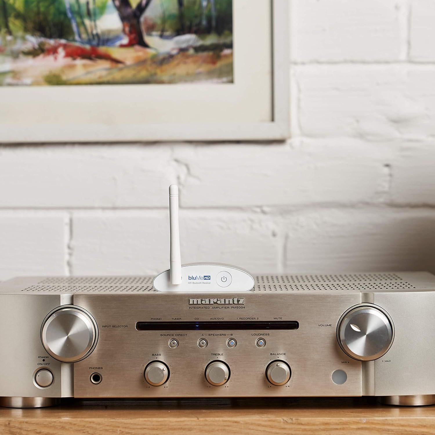 Auris BluMe HD Bluetooth receiver connected to a vintage hi-fi amplifier at home
